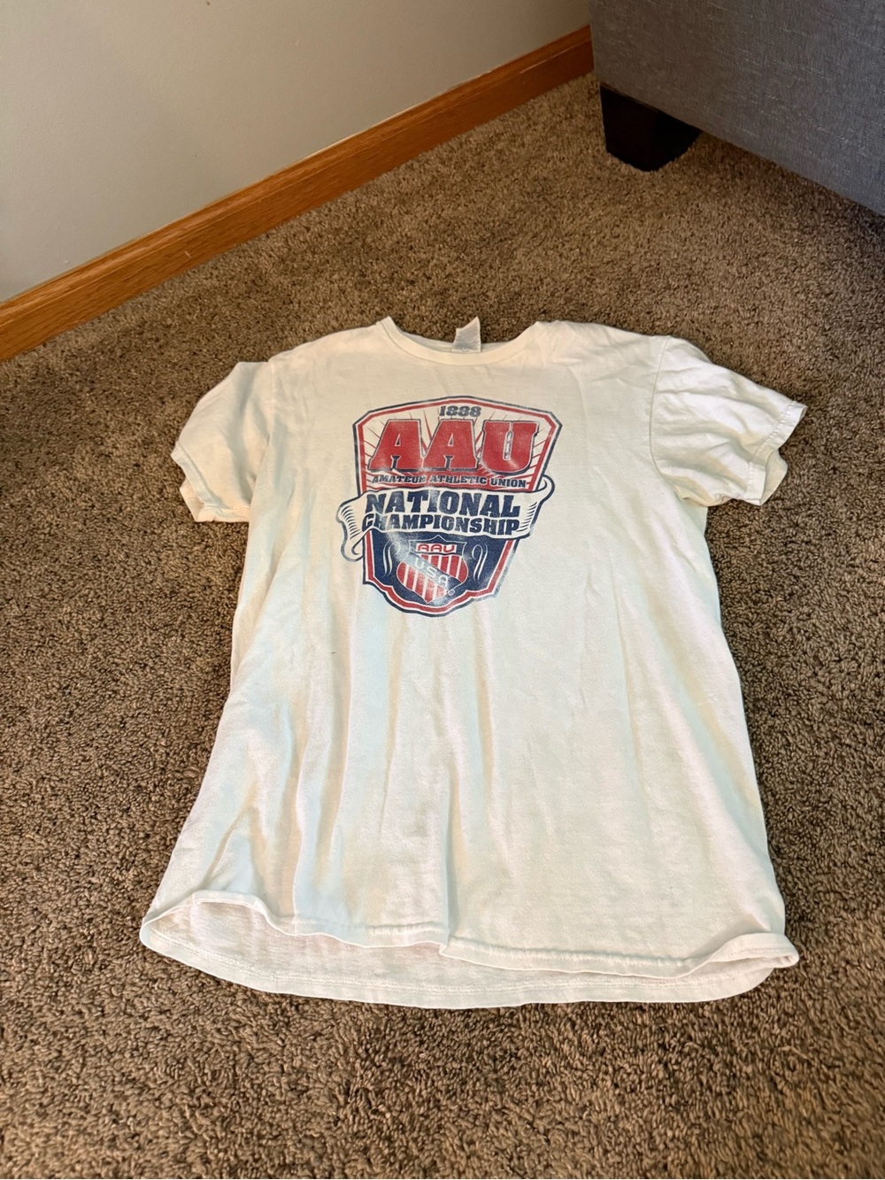 Delta White women AAU National Championship Graphic Tee with Red & Blue Logo